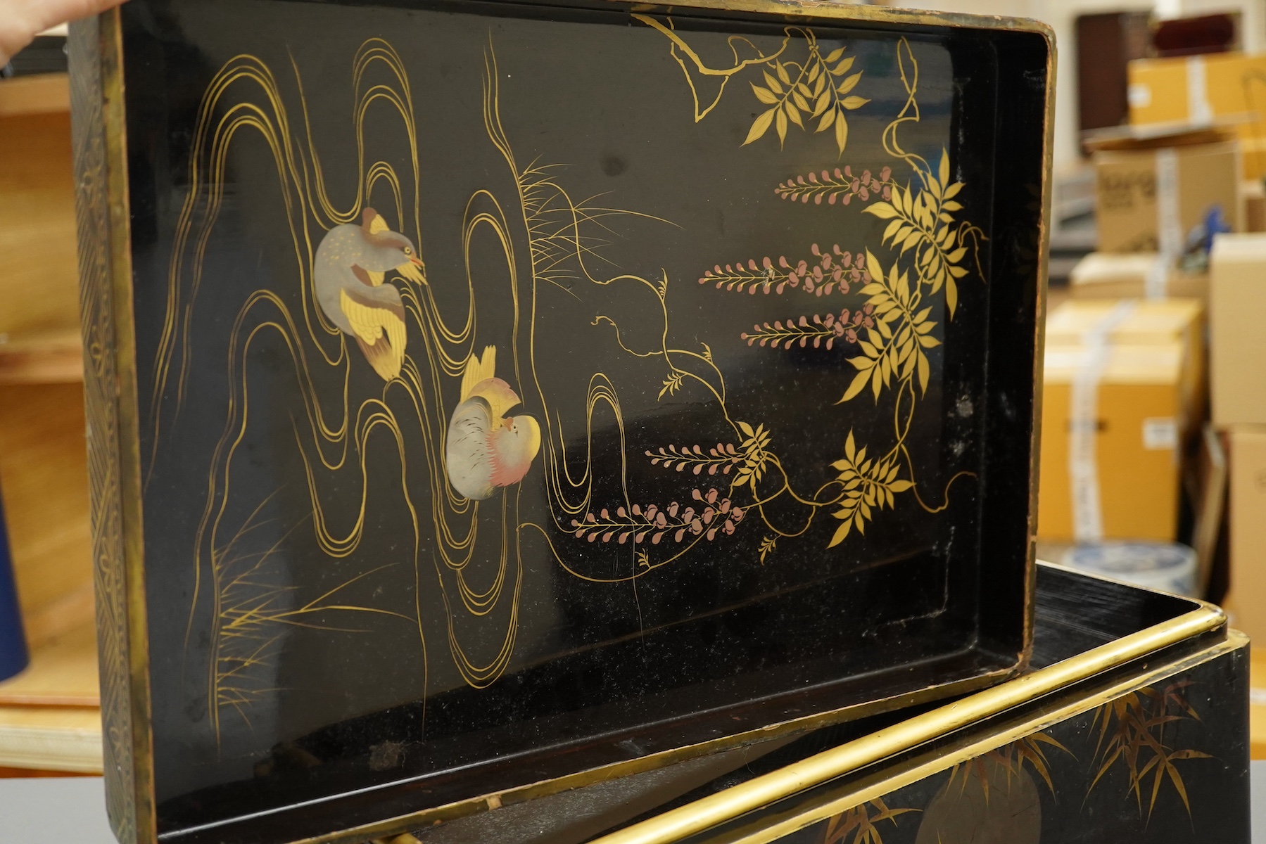 A 19th century Chinese export lacquer box containing assorted mother-of-pearl gaming counters and a 19th century Japanese lacquer box, largest 42.5cm wide. Condition - fair